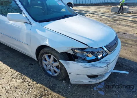 2004 Toyota Avalon Xl z USA, uszkodzony, nr VIN 4T1BF28B54U340196